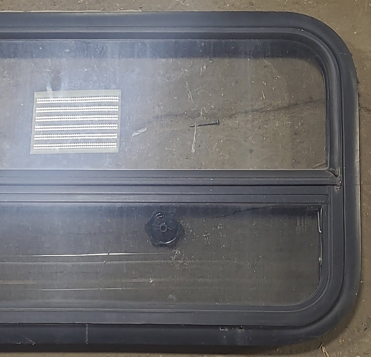 Used Black Radius Opening Window : 35 1/2" W X 17 1/4" H X 1 3/4" D