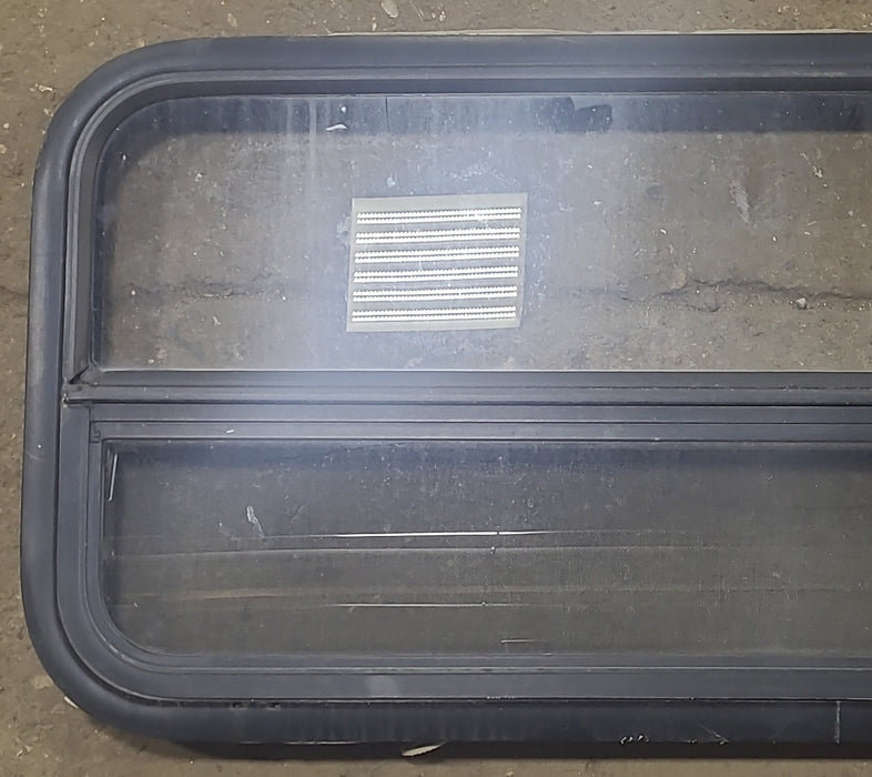 Used Black Radius Opening Window : 35 1/2" W X 17 1/4" H X 1 3/4" D