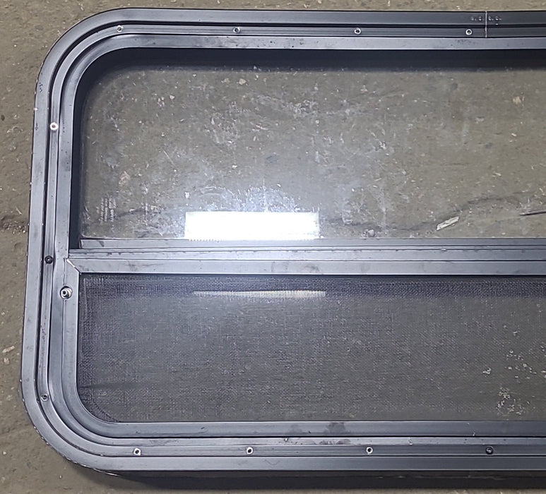 Used Black Radius Opening Window : 35 1/2" W X 17 1/4" H X 1 3/4" D