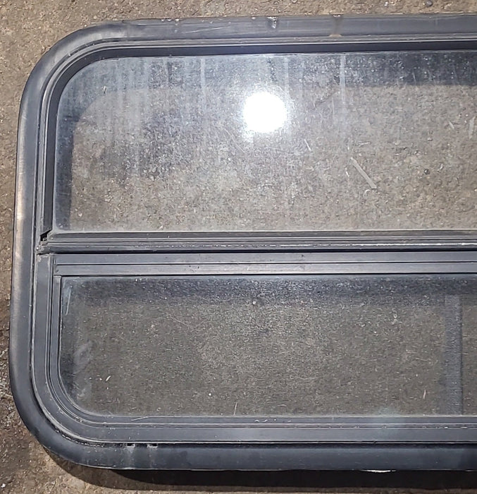 Used Black Radius Opening Window : 35 1/2" W x 17 1/4" H x 1 7/8" D