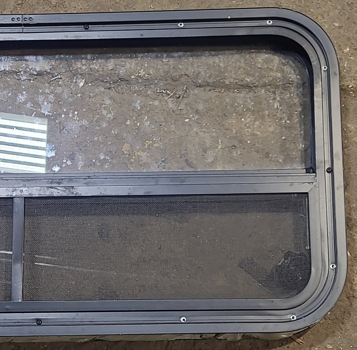 Used Black Radius Opening Window : 35 1/2" W x 17 1/4" H x 1 7/8" D