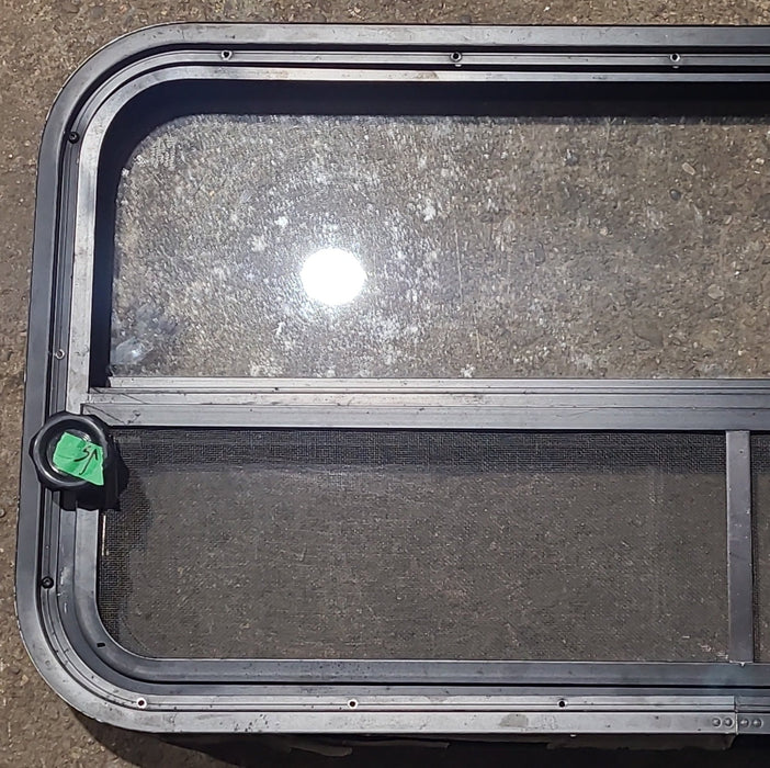 Used Black Radius Opening Window : 35 1/2" W x 17 1/4" H x 1 7/8" D