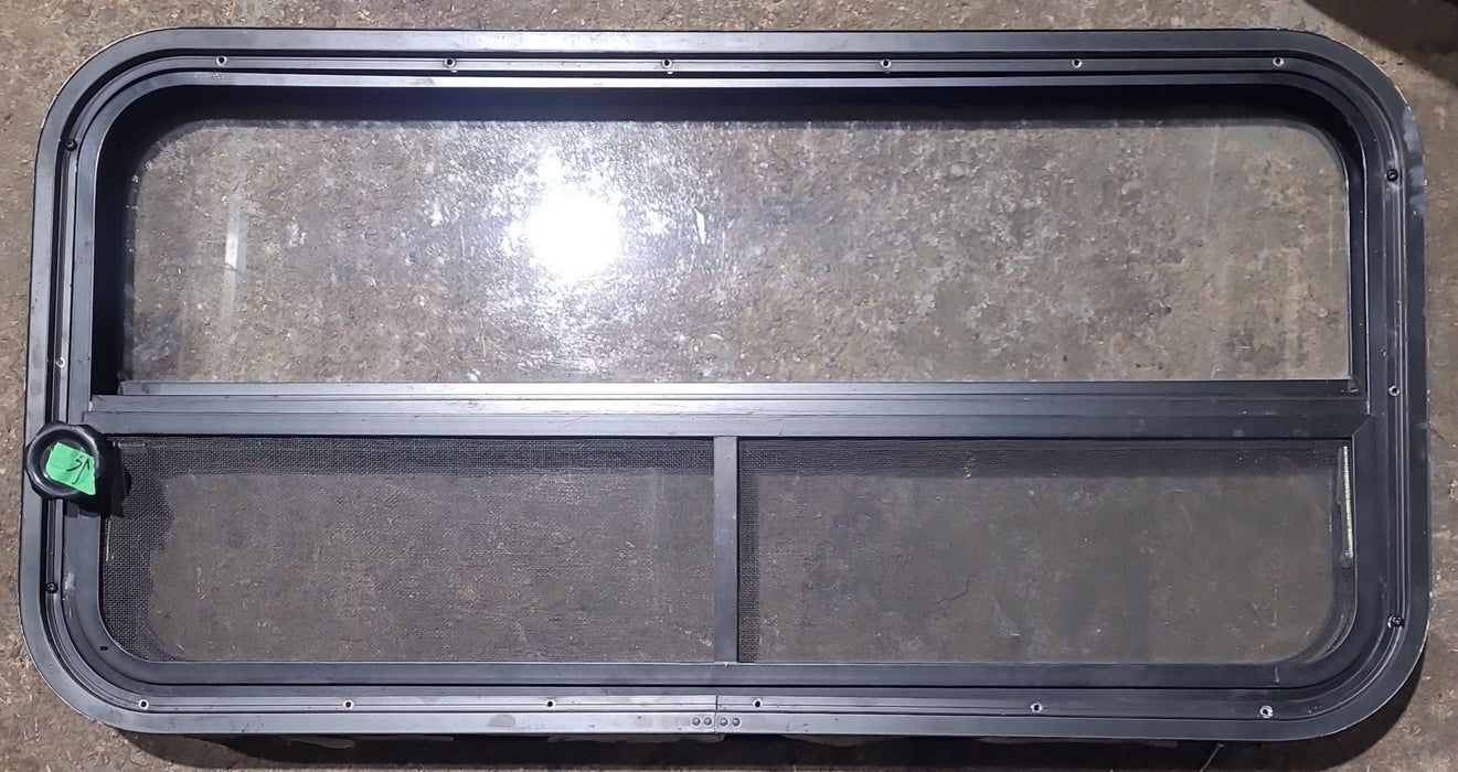 Used Black Radius Opening Window : 35 1/2" W x 17 1/4" H x 1 7/8" D
