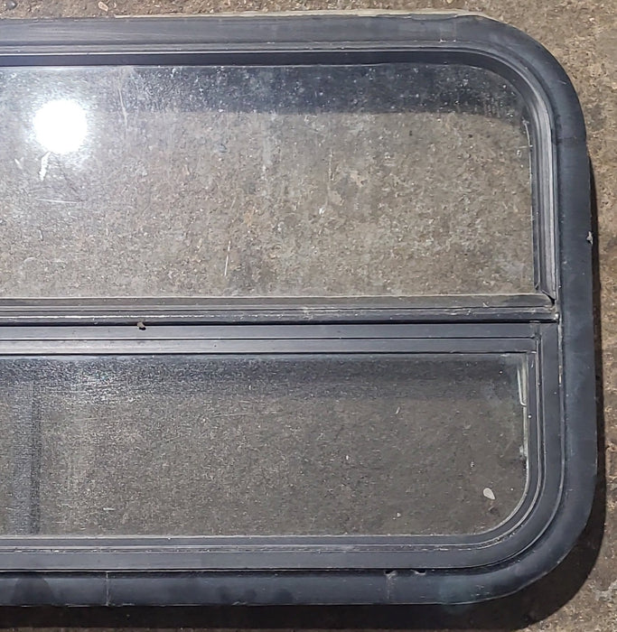 Used Black Radius Opening Window : 35 1/2" W x 17 1/4" H x 1 7/8" D