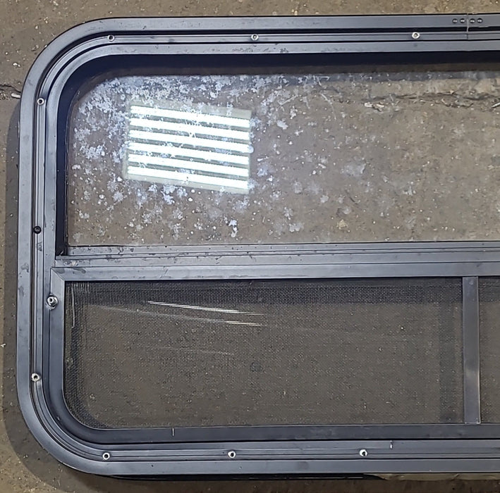 Used Black Radius Opening Window : 35 1/2" W x 17 1/4" H x 1 7/8" D