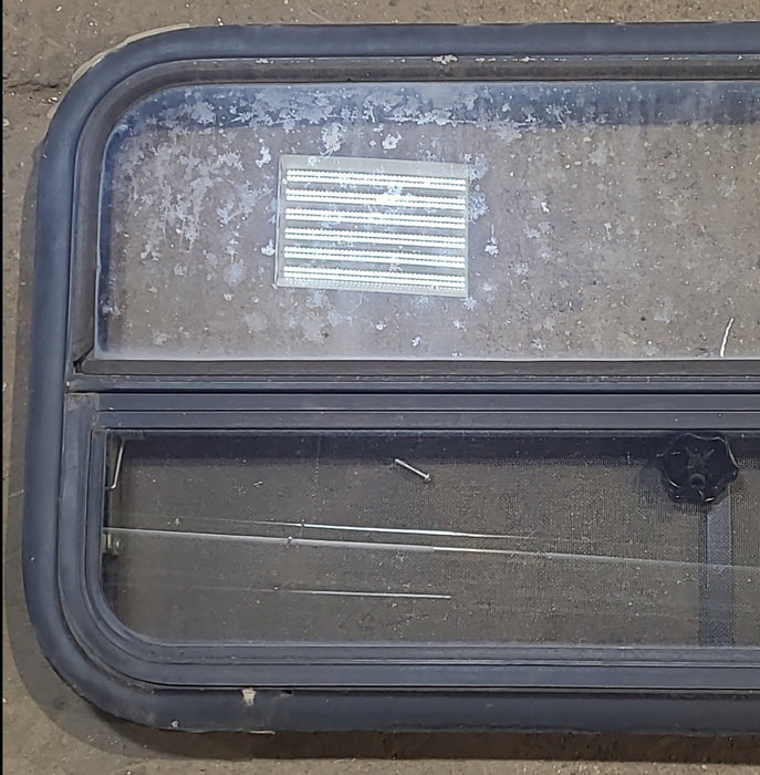 Used Black Radius Opening Window : 35 1/2" W x 17 1/4" H x 1 7/8" D
