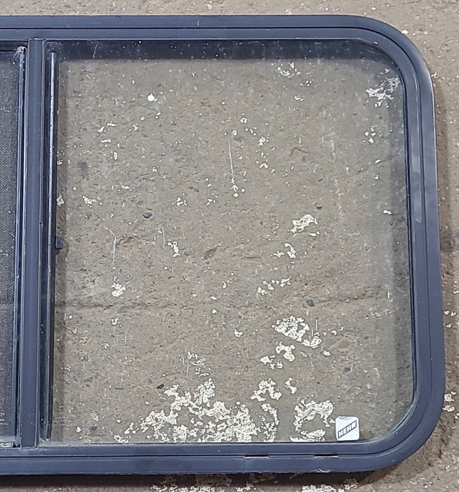 Used Black Radius Opening Window : 35 1/2" W x 19 5/8" H x 1" D