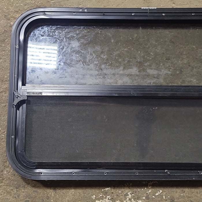 Used Black Radius Opening Window : 35 1/2" W x 21 1/2" H x 1 3/4" D - Young Farts RV Parts