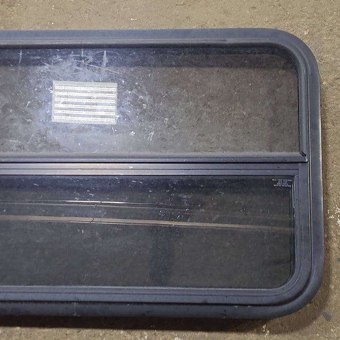 Used Black Radius Opening Window : 35 1/2" W x 21 1/2" H x 1 3/4" D - Young Farts RV Parts