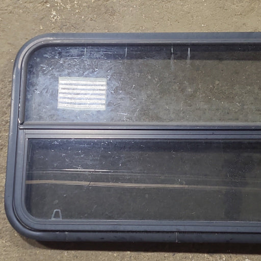 Used Black Radius Opening Window : 35 1/2" W x 21 1/2" H x 1 3/4" D - Young Farts RV Parts