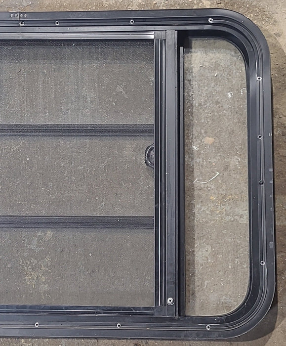 Used Black Radius Opening Window : 35 1/2" W x 22 1/4" H x 1 7/8" D