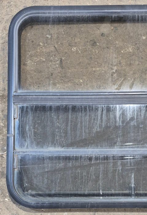 Used Black Radius Opening Window : 35 1/2" W x 28 3/4" H x 1 3/4" - Young Farts RV Parts