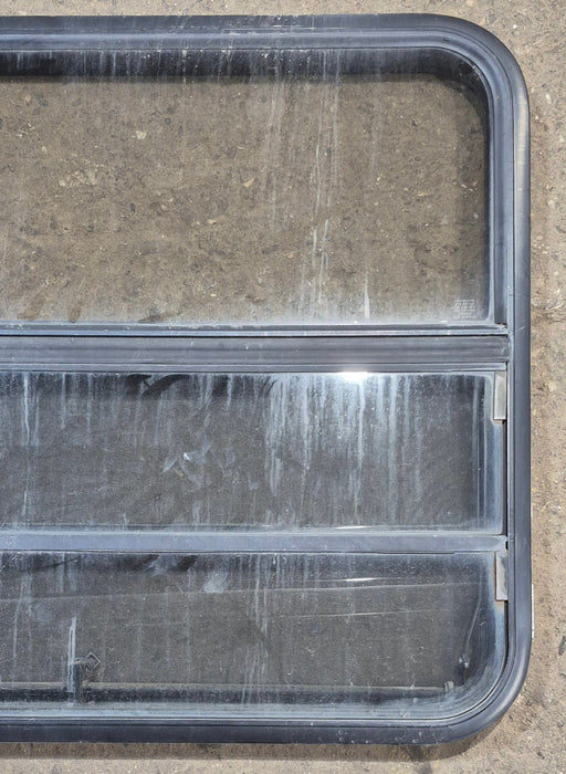 Used Black Radius Opening Window : 35 1/2" W x 28 3/4" H x 1 3/4" - Young Farts RV Parts