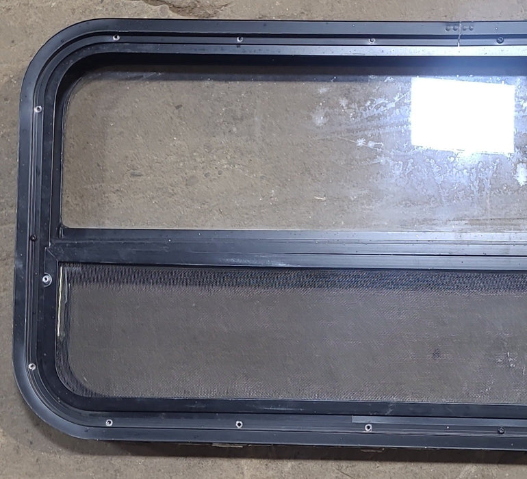 Used Black Radius Opening Window : 35 1/4" W x 17 1/4" H x 1 7/8" D
