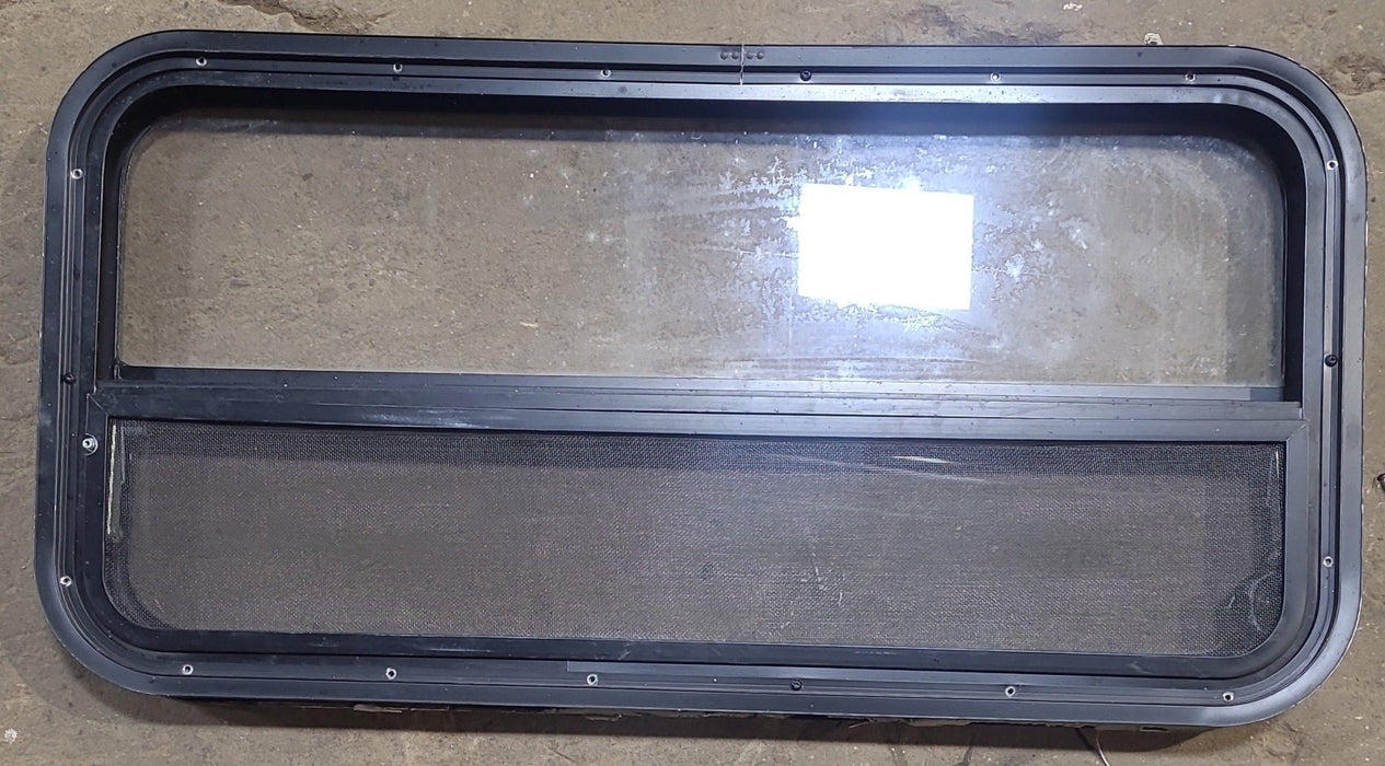 Used Black Radius Opening Window : 35 1/4" W x 17 1/4" H x 1 7/8" D