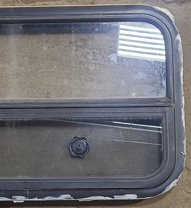 Used Black Radius Opening Window : 35 1/4" W x 17 1/4" H x 1 7/8" D