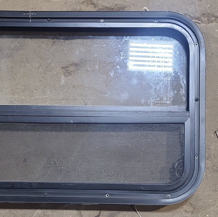 Used Black Radius Opening Window : 35 1/4" W x 17 1/4" H x 1 7/8" D