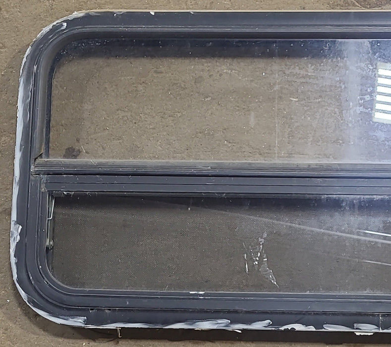 Used Black Radius Opening Window : 35 1/4" W x 17 1/4" H x 1 7/8" D