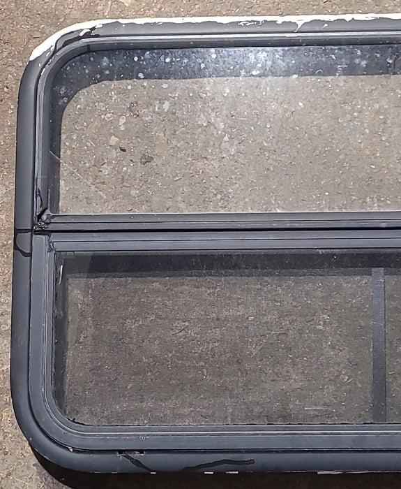 Used Black Radius Opening Window : 35 1/4" W x 21 1/4" H x 1 7/8" D