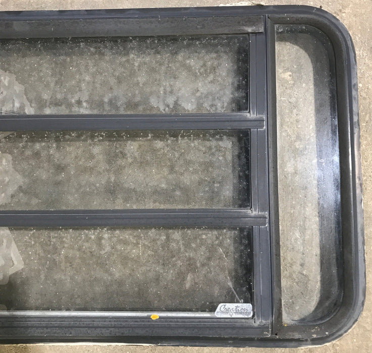 Used Black Radius Opening Window : 35 1/4" W x 21 1/4" H x 1 7/8" D
