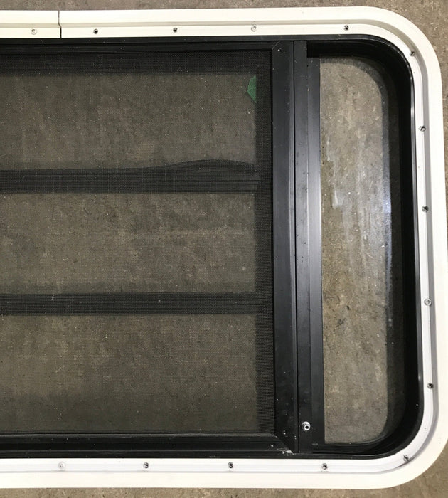 Used Black Radius Opening Window : 35 1/4" W x 21 1/4" H x 1 7/8" D