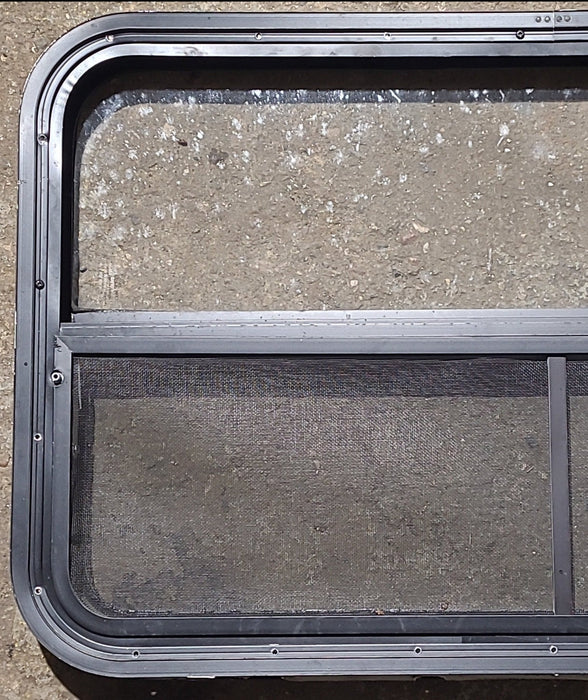 Used Black Radius Opening Window : 35 1/4" W x 21 1/4" H x 1 7/8" D