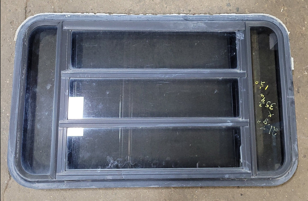 Used Black Radius Opening Window : 35 1/4" X 21 1/4" X 1 7/8" D