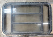Used Black Radius Opening Window : 35 3/4" W x 22 5/8" H x 1 1/4" D - Young Farts RV Parts