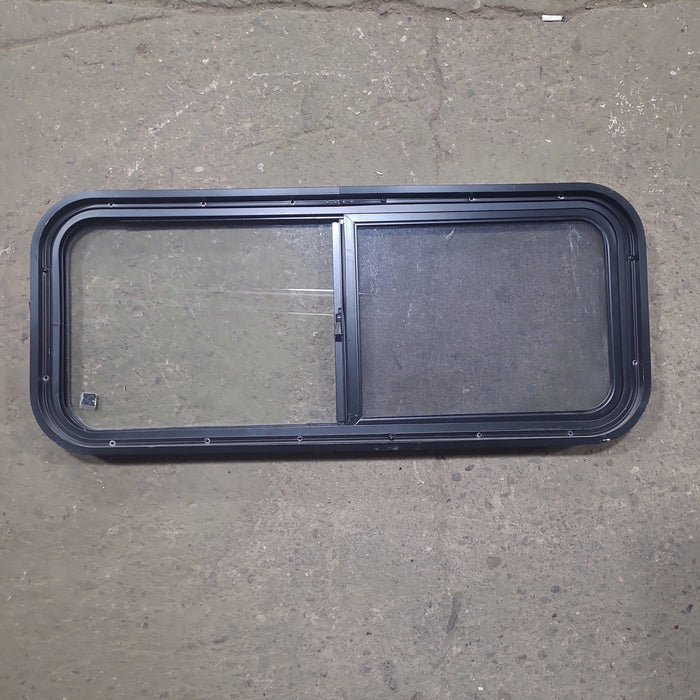 Used Black Radius Opening Window : 36 1/2" W x 14 3/4" H x 1 3/4" D - Young Farts RV Parts