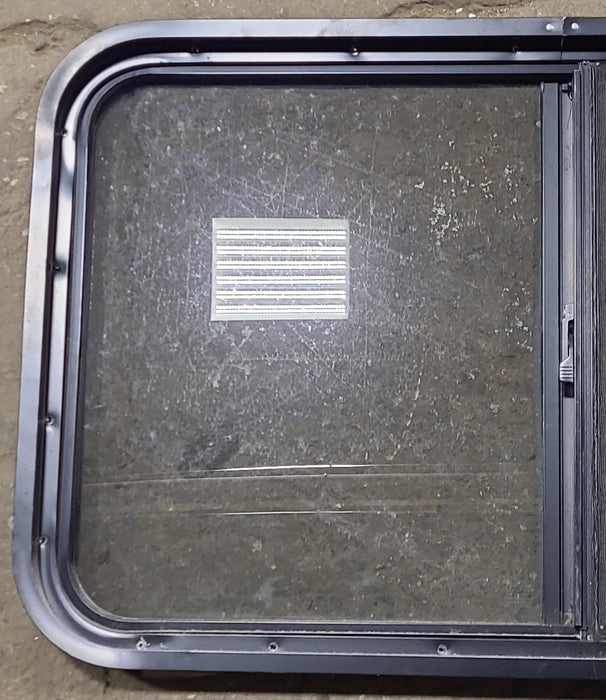Used Black Radius Opening Window : 36 1/2" W x 21 3/4" H x 1 3/4" D