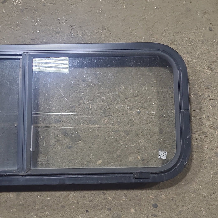 Used Black Radius Opening Window : 36 1/4" W x 14 3/4" H x 1 3/4" D - Young Farts RV Parts