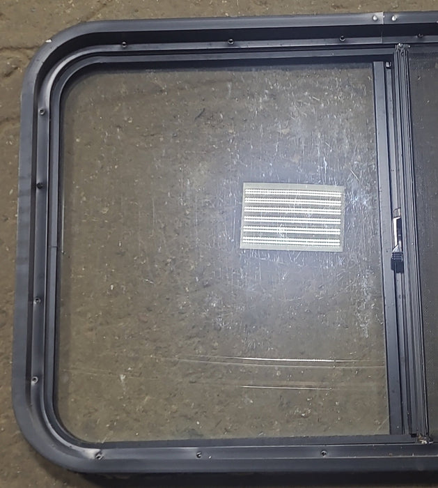 Used Black Radius Opening Window : 36 1/4" W x 21 3/4" H x 1 7/8" D