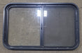 Used Black Radius Opening Window : 36 1/4" W x 21 3/4" H x 1 7/8" D - Young Farts RV Parts