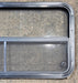 Used Black Radius Opening Window : 41 1/2" W x 21 1/2" H x 1 1/2" - Young Farts RV Parts