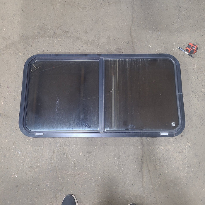 Used Black Radius Opening Window : 42 1/2" W x 22 3/4" H x 1 3/4" D