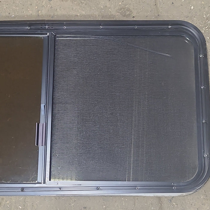 Used Black Radius Opening Window : 42 1/2" W x 22 3/4" H x 1 3/4" D