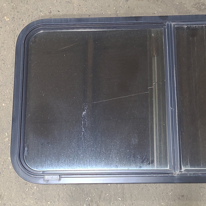 Used Black Radius Opening Window : 42 1/2" W x 22 3/4" H x 1 3/4" D