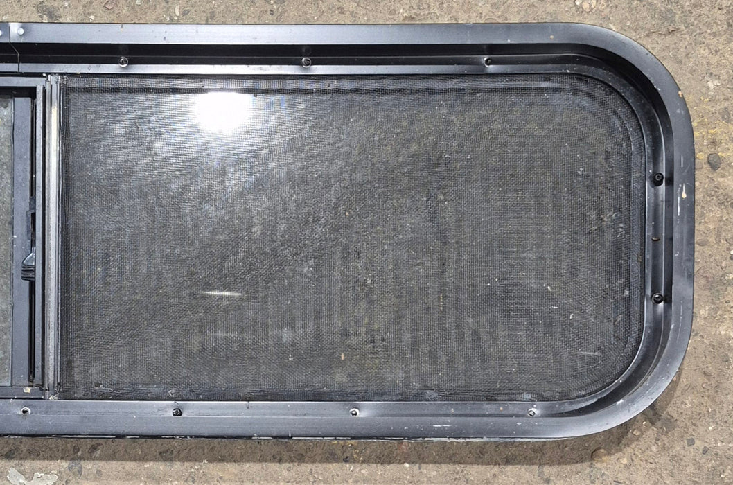 Used Black Radius Opening Window : 42 1/4" W x 11 3/4" H x 1 7/8" - Young Farts RV Parts