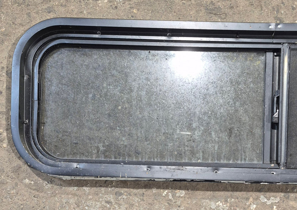 Used Black Radius Opening Window : 42 1/4" W x 11 3/4" H x 1 7/8" - Young Farts RV Parts