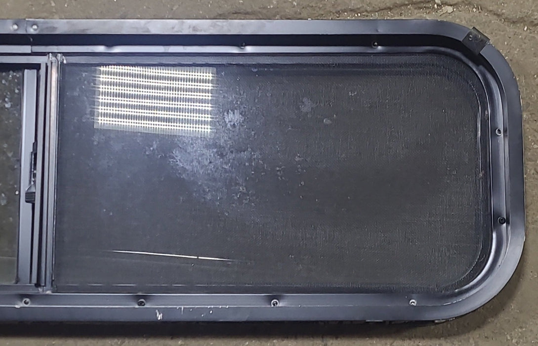 Used Black Radius Opening Window : 42 1/4" W x 11 3/4" H x 1 7/8" D