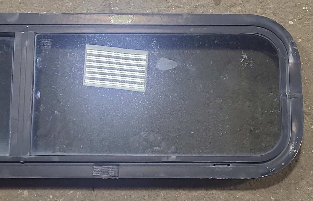 Used Black Radius Opening Window : 42 1/4" W x 11 3/4" H x 1 7/8" D