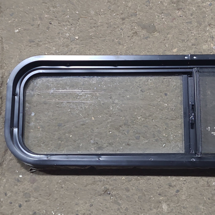 Used Black Radius Opening Window : 42 1/4" W x 11 3/4" H x 1 7/8" D