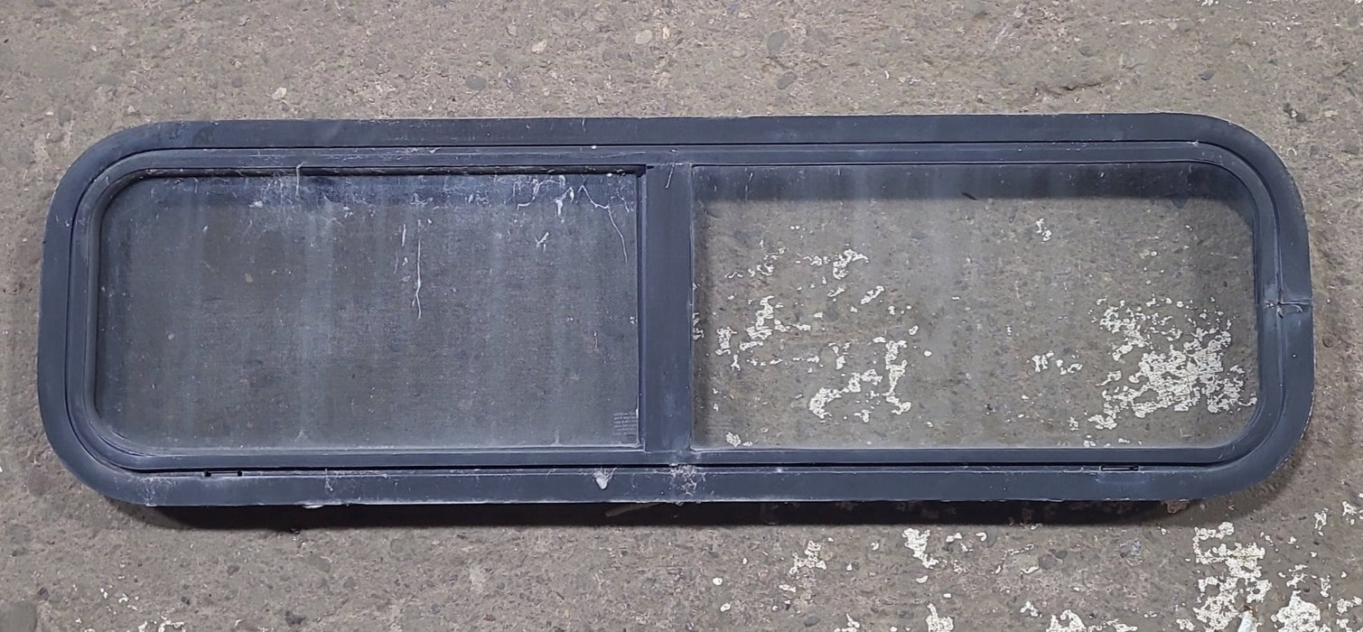 Used Black Radius Opening Window : 42 1/4" W x 11 3/4" H x 1 7/8" D