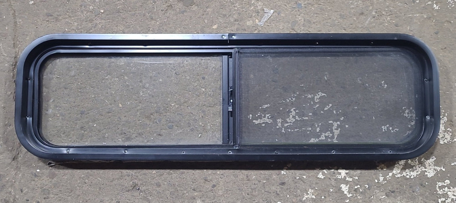 Used Black Radius Opening Window : 42 1/4" W x 11 3/4" H x 1 7/8" D