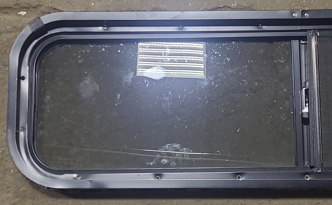 Used Black Radius Opening Window : 42 1/4" W x 11 3/4" H x 1 7/8" D