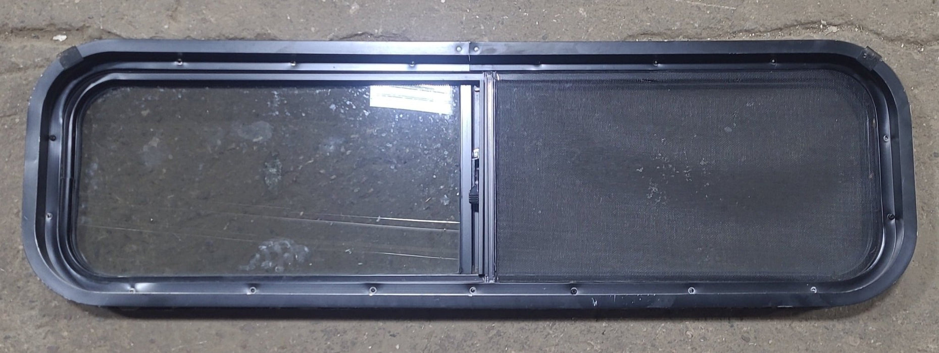 Used Black Radius Opening Window : 42 1/4" W x 11 3/4" H x 1 7/8" D
