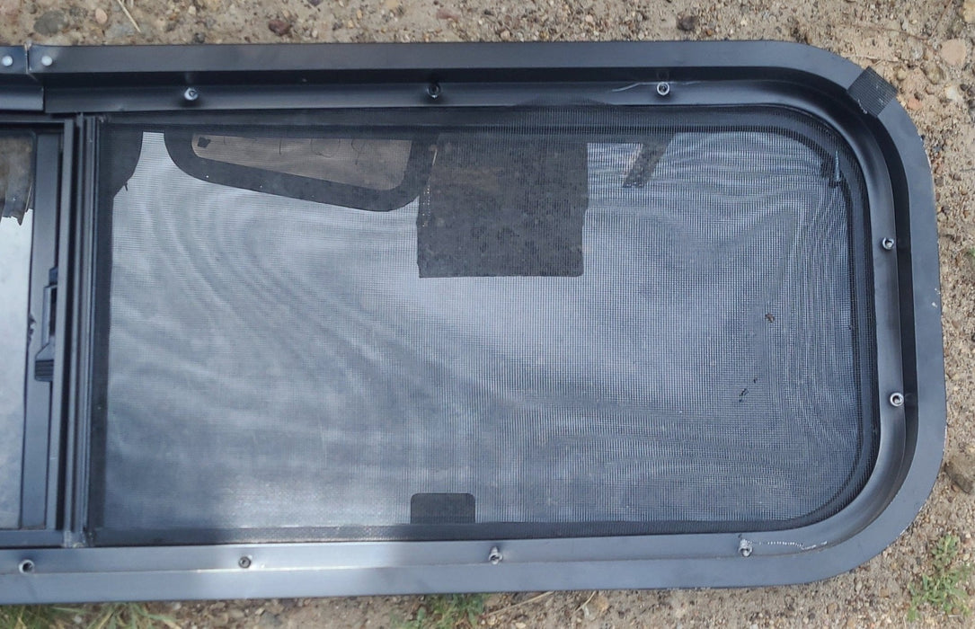 Used Black Radius Opening Window : 42 1/4" W x 11 3/4" H x 1 7/8" D