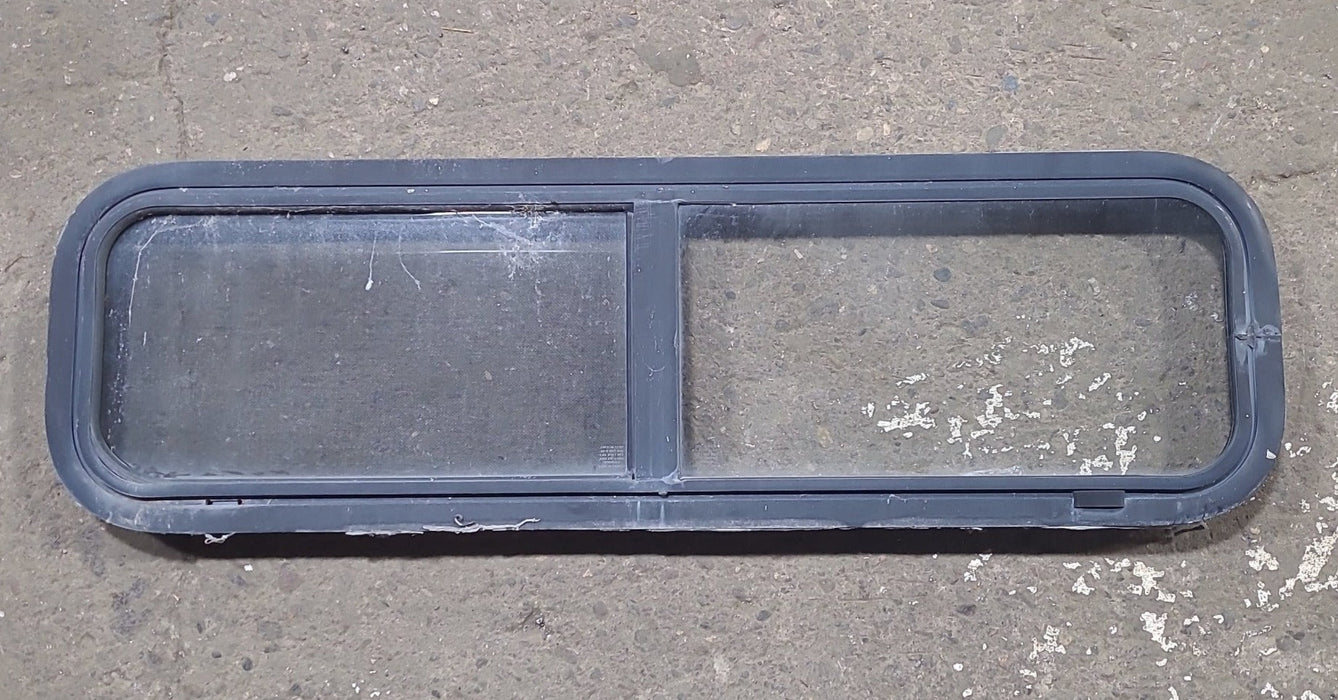 Used Black Radius Opening Window : 42 1/4" W x 11 3/4" H x 1 7/8" D
