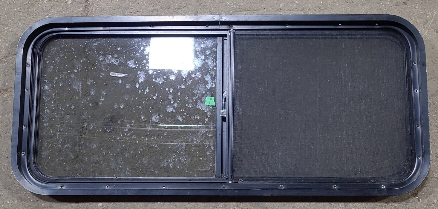 Used Black Radius Opening Window : 42 1/4" W x 17 3/4" H x 1 3/4" D - Young Farts RV Parts