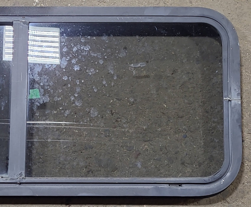 Used Black Radius Opening Window : 42 1/4" W x 17 3/4" H x 1 3/4" D
